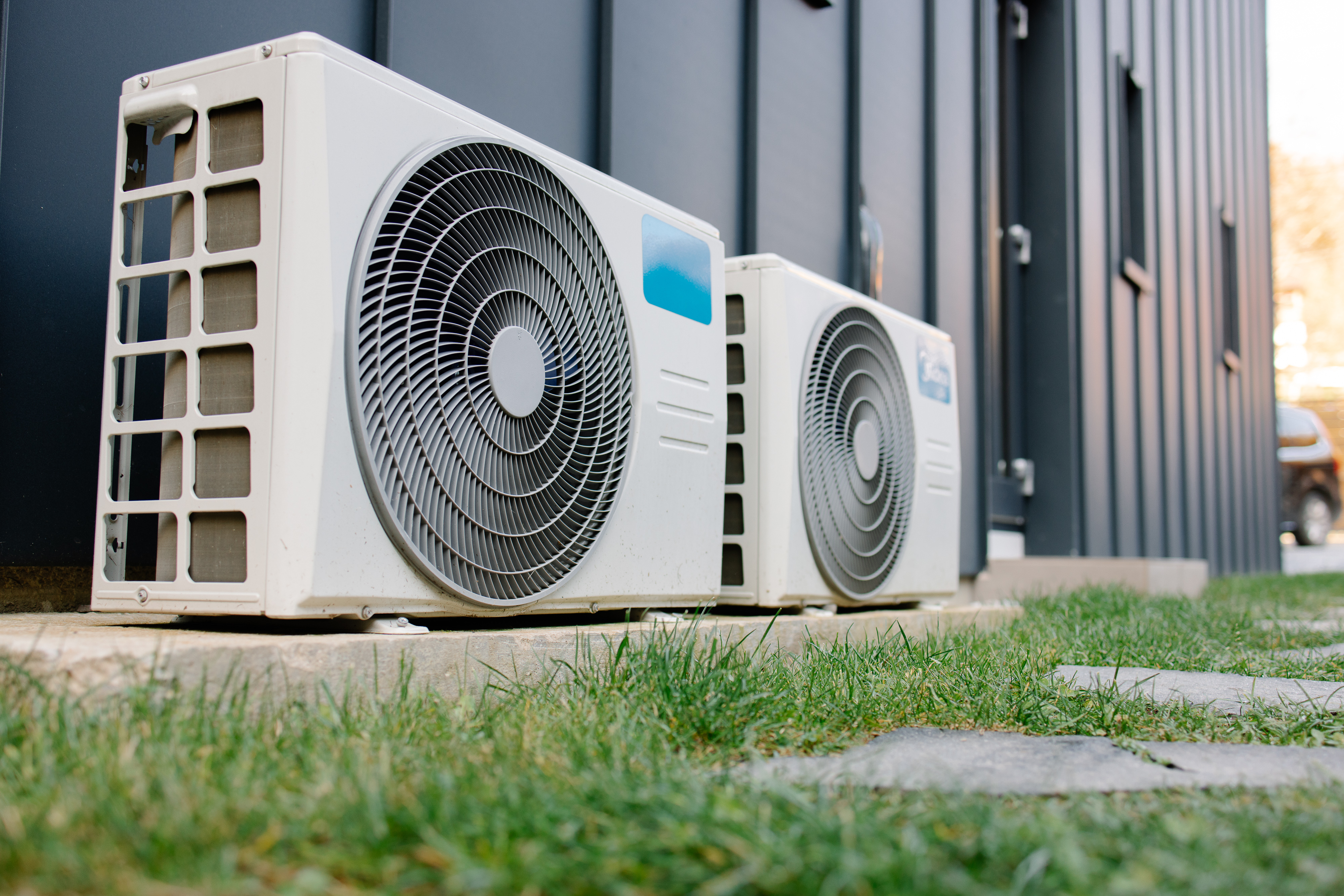 Air source heat pump installed outside a UK home